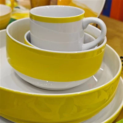 طقم عشاء سيراميك أصفر وأبيض قابل للتكديس